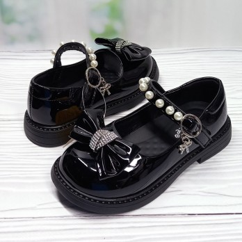 Дитячі туфлі для дівчинки, чорні, лакові.
